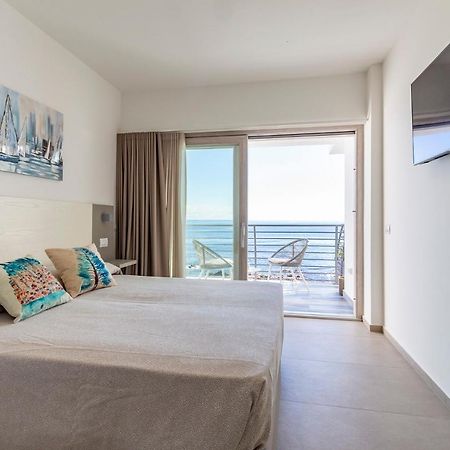 Hotel Caramare Cala Gonone Bagian luar foto