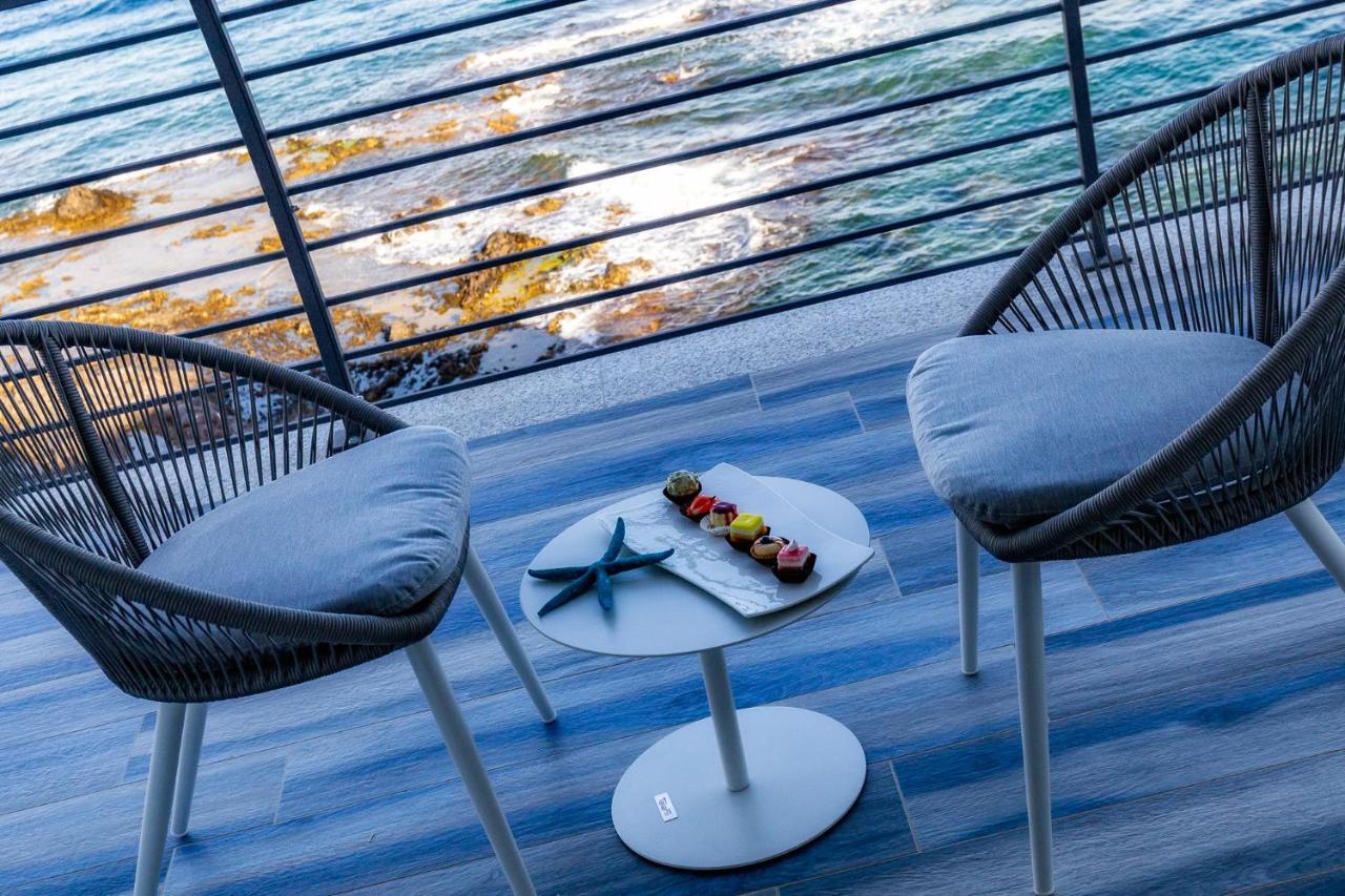 Hotel Caramare Cala Gonone Bagian luar foto