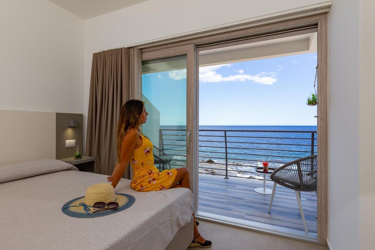Hotel Caramare Cala Gonone Bagian luar foto