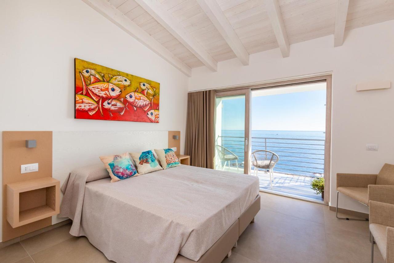 Hotel Caramare Cala Gonone Bagian luar foto