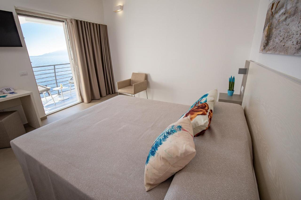 Hotel Caramare Cala Gonone Bagian luar foto
