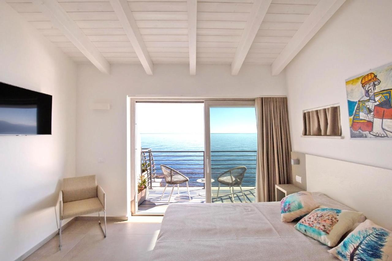 Hotel Caramare Cala Gonone Bagian luar foto