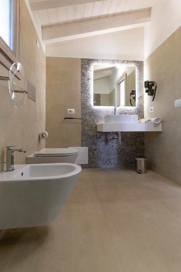 Hotel Caramare Cala Gonone Bagian luar foto